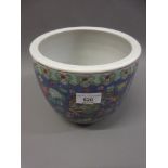 Chinese jardiniere painted with flowers and dragons on a blue ground, 7ins high