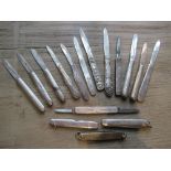 Collection of eleven various silver and steel bladed folding fruit knives, together with four