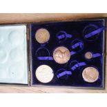 Jewellery box containing a small quantity of costume jewellery and a case containing five various