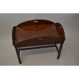 George III mahogany drop-sided butler's tray on a later mahogany base