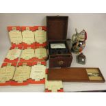 Mahogany cased set of drawing instruments, leather cased amp meter, a pewter and leather hip