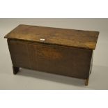 Small 17th Century oak plank coffer with hinged lid