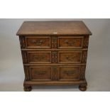 Small early 18th Century oak chest of three graduated drawers with applied mouldings and split
