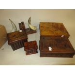 Small 19th Century olive wood book form puzzle box, together with three other boxes and a pair of