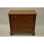 19th Century mahogany dwarf straight front chest, the crossbanded and line inlaid top above four
