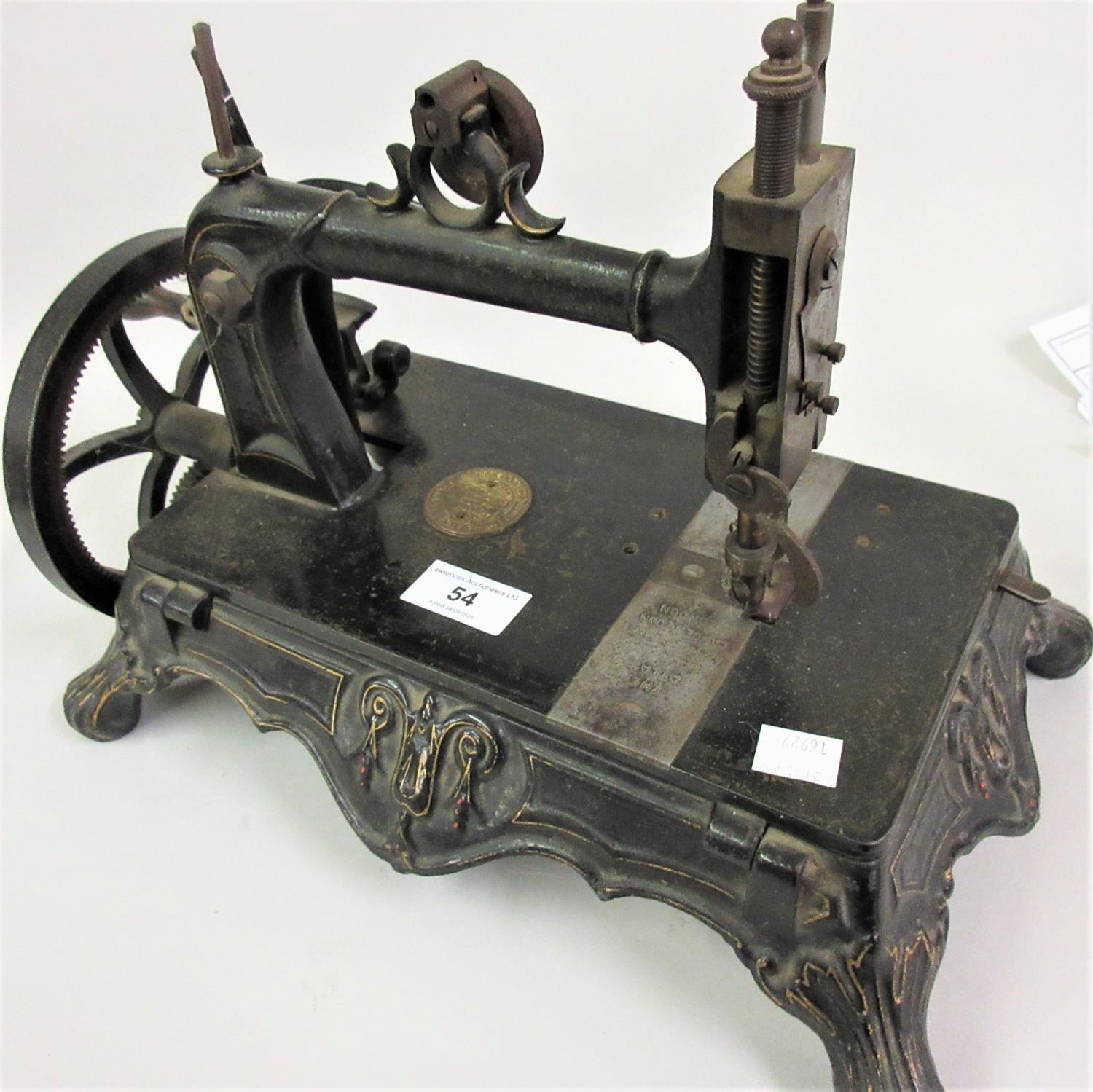 Early hand operated sewing machine by the Atlas Sewing Machine Company, London