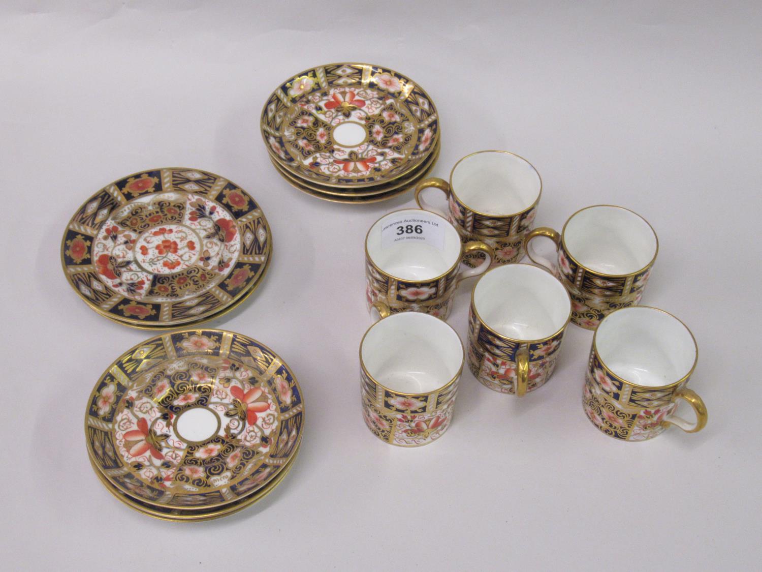 Set of six Royal Crown Derby Imari pattern coffee cans with saucers, together with two other Imari