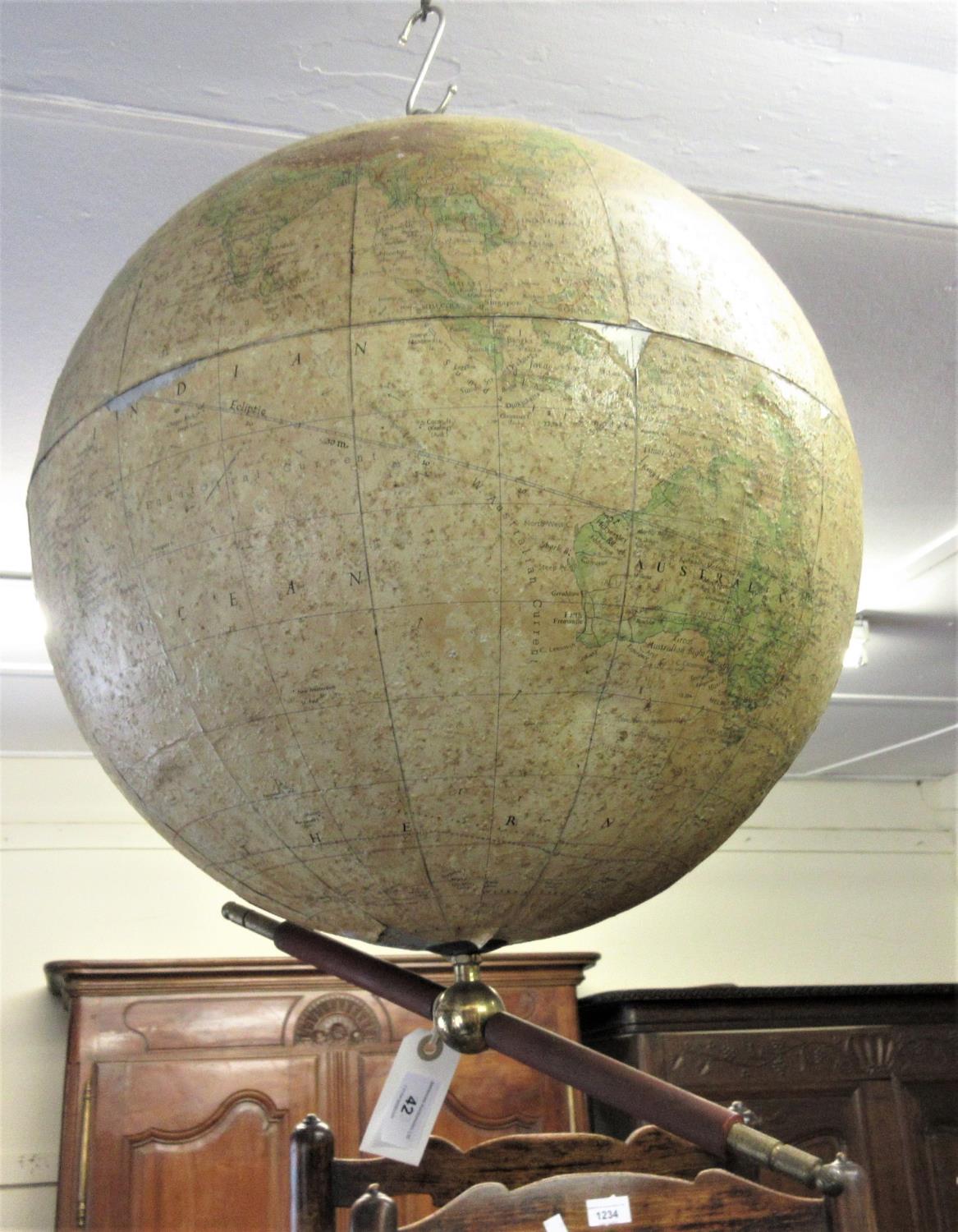 Philips' 19in terrestrial globe, the aluminium body with paper covering and brass suspension system