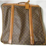 Louis Vuitton, folding suit carrier with leather straps and leather handles (wear from use)