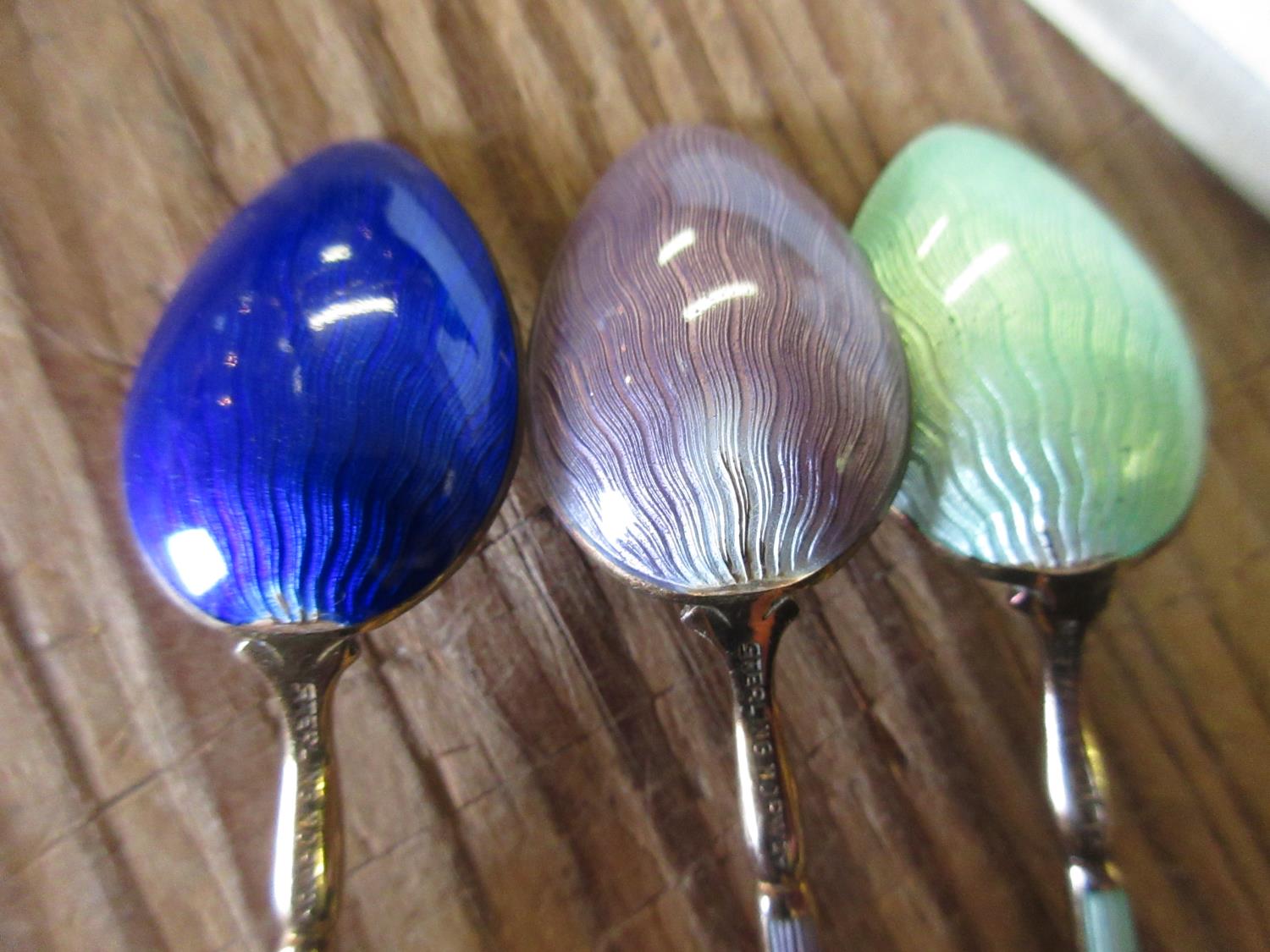 Boxed set of six Norwegian sterling silver and coloured enamel decorated coffee spoons Chips to - Image 7 of 7