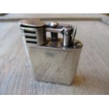 Dunhill ' Unique ' London silver mounted sports lighter (no case), 2.25ins high Case in good clean