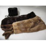 Mink stole, two other fur stoles, a fur muff and a mid tan fur coat