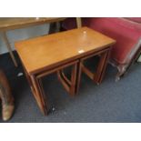 Mid 20th Century McIntosh teak nest of three tables with fold-over top