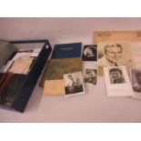 Box file containing a collection of autograph books and celebrity photographs, some signed,