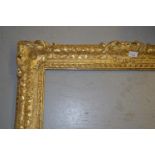 Good quality antique gilt picture frame with relief moulded stylised floral shell and gadroon