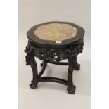 19th Century Chinese carved hardwood vase stand with a marble inset top Marble not cracked but is