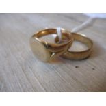 18ct Gold wedding band and an unmarked yellow metal signet ring (initials worn), 14gms