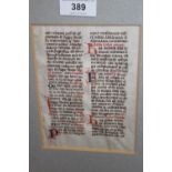 Framed Medieval leaf of text from a manuscript inscribed verso ' Leaf from a Breviary - Cologne,