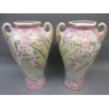 Pair of early 20th Century Japanese hexagonal baluster form vases decorated with butterflies and