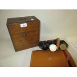 Victorian oak two bottle decanter box and a pair of Swallow binoculars