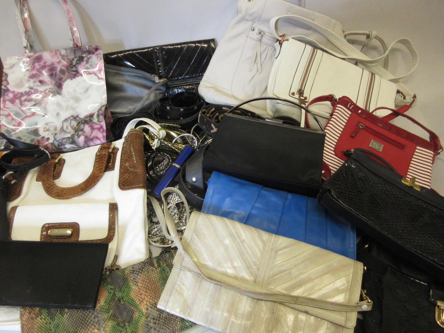 Quantity of various ladies handbags, together with a quantity of ladies belts