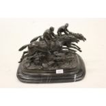 20th Century brown patinated bronze group of two racehorses with jockeys, mounted on a rectangular