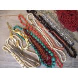 Malachite bead necklace, two coral necklaces and various 19th Century ivory bead necklaces and