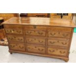 George III oak and mahogany crossbanded mule chest of Lancashire type, the moulded top above six