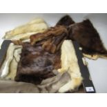 Box containing a quantity of various fur stoles and muffs etc