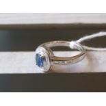 18ct White gold sapphire and baguette cut diamond cluster ring