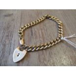 9ct Gold curb link bracelet with padlock clasp 8.9g