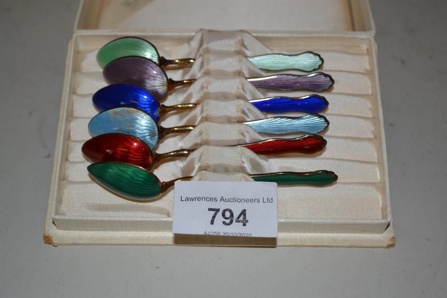 Boxed set of six Norwegian sterling silver and coloured enamel decorated coffee spoons Chips to