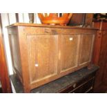 Reproduction oak plank coffer with hinged lid Three plank top - join opened up. Lock missing.