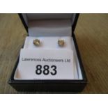 Pair of 18ct white gold diamond ear studs with claw settings, approximately 1.02ct total