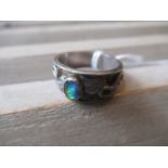 Silver and opal set ring of stylised band design Size M/N