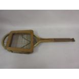 Vintage tennis racket with fish tail handle, together with three other vintage tennis rackets