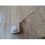 18ct White gold baguette cut and brilliant cut diamond pendant on a silver chain