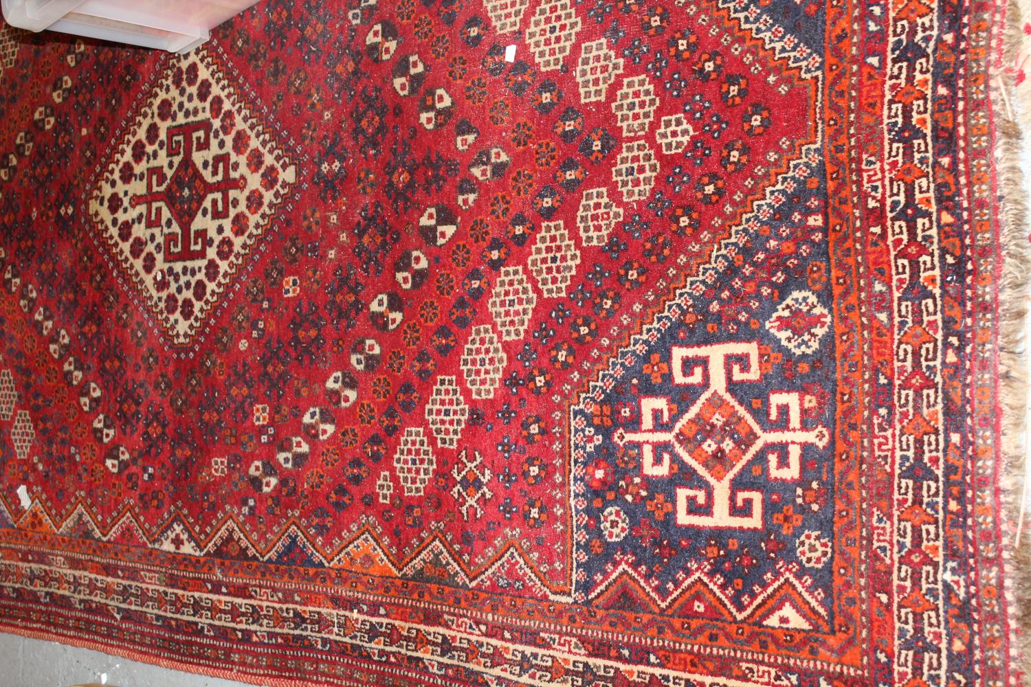 Shiraz rug of centre medallion and all-over geometric floral design with borders, approximately