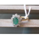 18ct Yellow gold oval emerald and diamond cluster ring, the emerald approximately 1.2ct, the