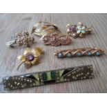 Seven various brooches