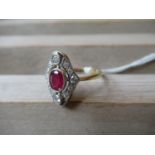 18ct Yellow gold ring having central ruby surrounded by diamonds, 0.30ct Dia / 0.85ct ruby