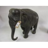 Large antique ebony figure of an elephant (at fault, lacking ears, tusks etc.), 15ins high