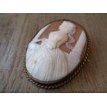 Large cameo brooch carved with a portrait of a lady in profile