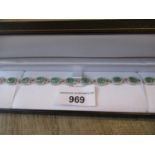 18ct White gold emerald and diamond line bracelet, diamonds of approximately 1.59ct total,