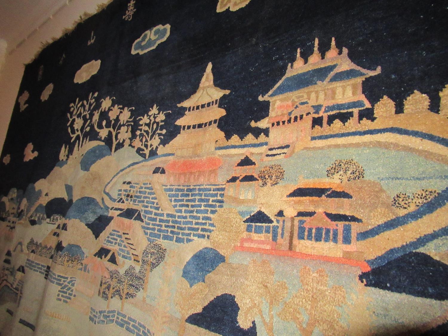 Chinese rug woven with a landscape design in shades of blue, pink and beige beneath a row of seven - Image 6 of 10