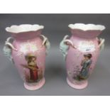 Pair of 19th Century French baluster form vases with mask head handles decorated with figures and