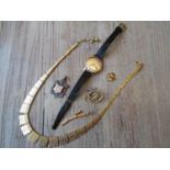 Ladies 9ct gold cased Accurist wristwatch, an unmarked yellow metal and split pearl brooch, a 9ct