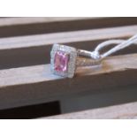 18ct White gold pink sapphire and diamond ring of halo design