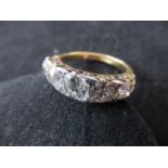 18ct Yellow gold five stone diamond set half hoop ring, the central stone approximately 0.75ct