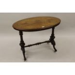 Victorian oval figured walnut and boxwood inlaid occasional table raised on spiral twist end